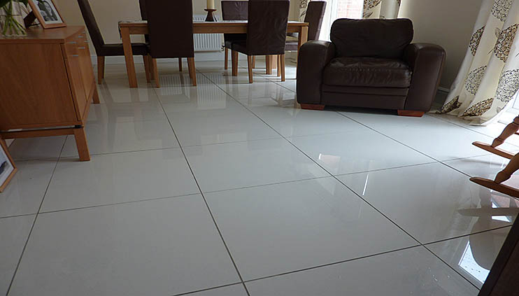 Large grey porcelain floor tiles in a living room